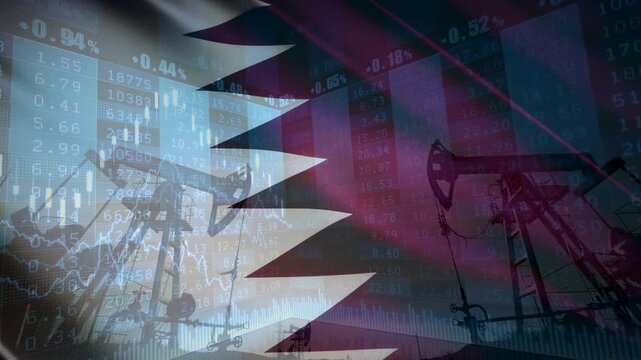 Oil pumps and rig with Qatar Waving Flag.