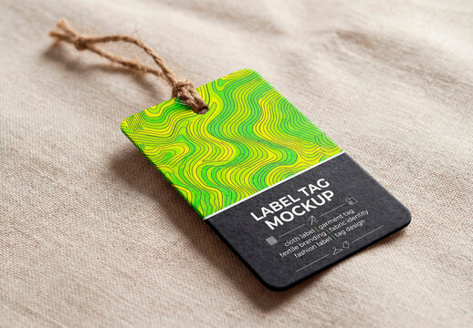 Minimal recycled paper tag label with rope on linen fabric