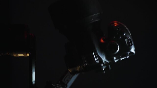 vertical video new electronic gyroscopic stabilizer for small SLR and mirrorless cameras and still cameras controlled via smartphone or joystick