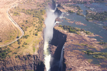 Naklejka premium Victoria Falls aerial: Zambezi River, gorge, landscape.