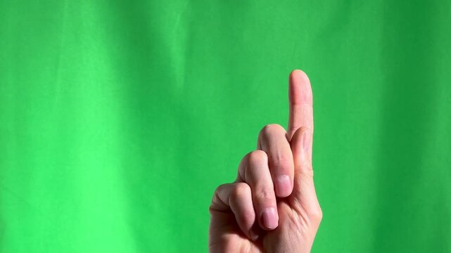 Count down from five to one finger. Hand gesture, sign. Close-up on chromakey green background.