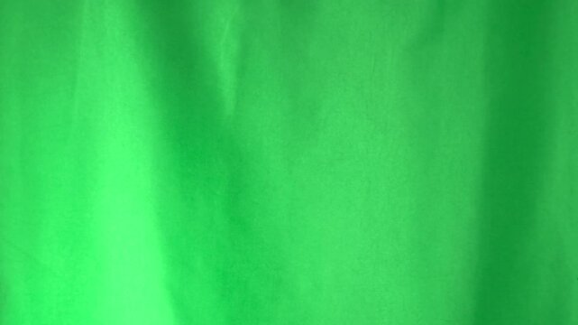 Double click raising up. Hand gesture, sign. Close-up on chromakey green background.