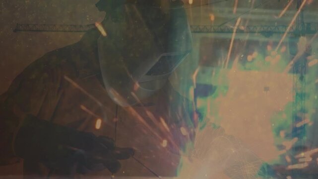 Factory workers working at spot welding. Close Up of Metal Welding. Sparks from welding steel background.