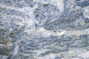 Naklejka premium Close up of limestone surface texture. Sedimentary rock background