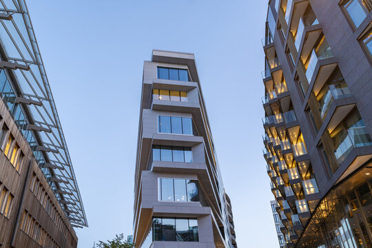 View of modern architecture rises with geometric precision against the clear sky, reflecting the city's innovative spirit, Tjuvholmen, Oslo, Norway.