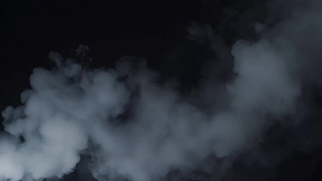 White smoke against black background