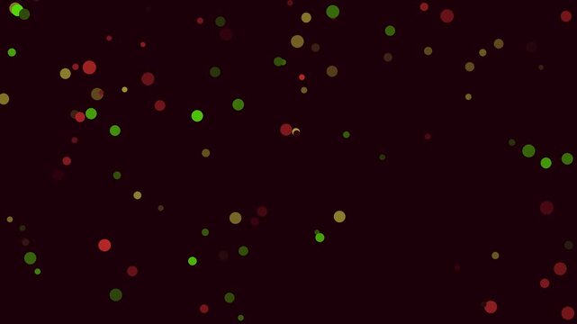 Abstract background with falling colorful particles and bokeh effect in dark maroon tone