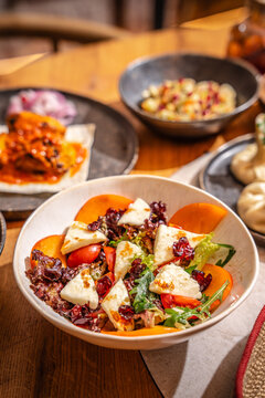 Fresh salad with grilled cheese and vegetables