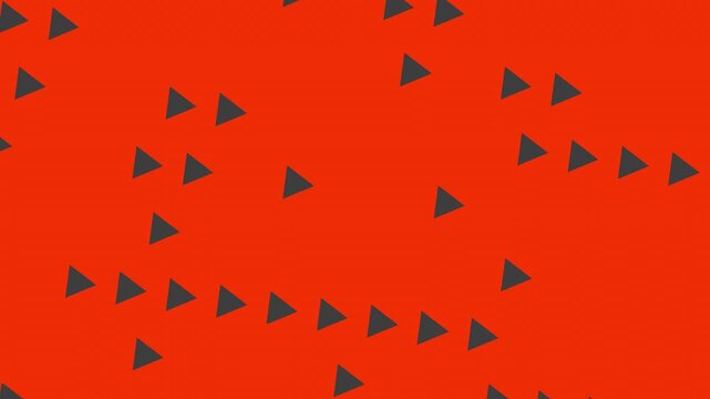 Red abstract pattern with moving triangles. This dynamic background is suitable for various creative and modern projects.