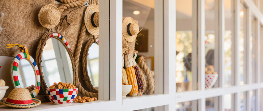 A close-up shot of a window sill with a bowl of corn on it.