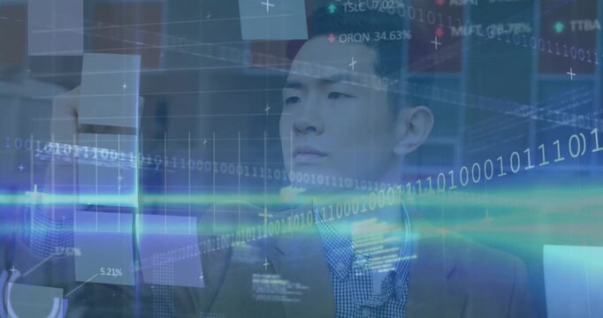 Animation of data processing and light trails over asian businessman writing on memo notes at office