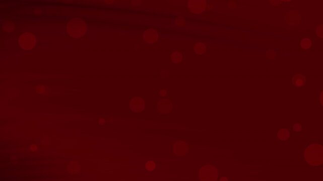 Blurry reddish maroon background with bokehlike spots, perfect for backgrounds, digital designs, festive projects, or abstract concepts. Energy and vibrancy.