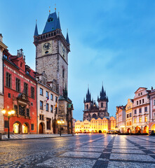 Fototapeta premium Prague Old Town square illuminated at sunrise, Czech Republic