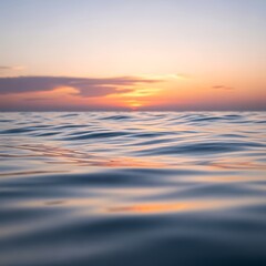 Fototapeta premium Peaceful ocean waves at sunset.