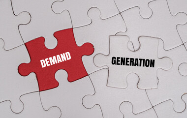 Fototapeta premium DEMAND GENERATION word alphabet letters on puzzle. A conceptual visual for marketing strategy, lead acquisition and business growth