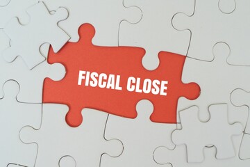 Fototapeta premium FISCAL CLOSE word alphabet letters on puzzle. Concept for financial year-end, accounting deadlines, tax preparation, and completing corporate business cycles