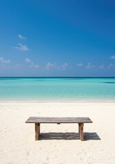 Fototapeta premium An idyllic wooden bench sits on white sand overlooking crystal clear turquoise ocean water, promising tranquility and the ultimate tropical escape ,blue ,wooden ,resort