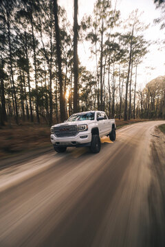 GMC Denali truck driving down a dirt road in Beaufort, South Carolina, march 1, 2026