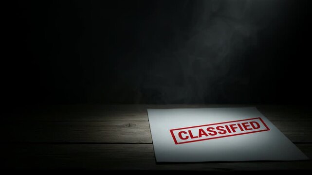 Paper with classified stamp on dark wooden surface. Secret document hidden in smoke. Mysterious information, government files and top secret investigation concept.