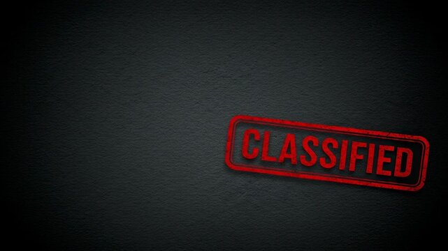 Red classified stamp on dark textured background. Secret document marking with grunge style indicator. Security clearance verification for confidential information data.