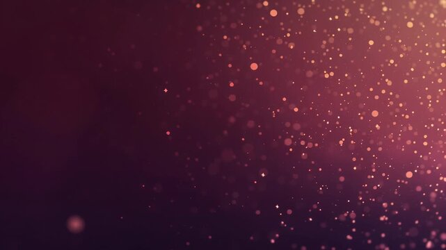Slow pan of floating golden particles drifting and shimmering across dark purple studio backdrop
