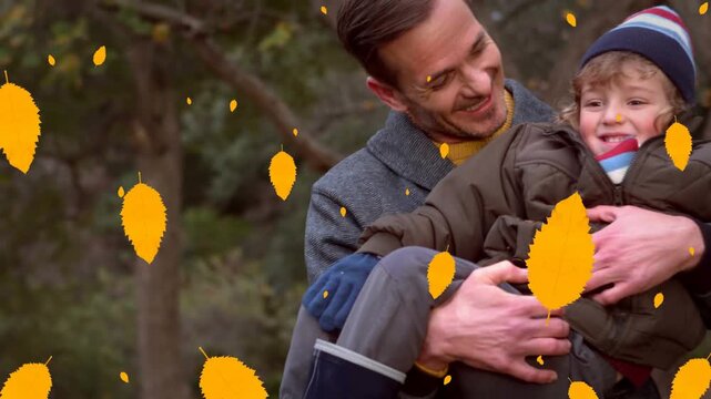 Animation of fall leaves falling over happy caucasian father and son in autumn park