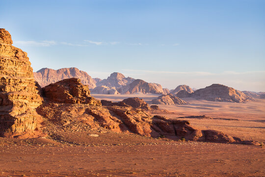 Dramatic rock formations n a rural Wadi landscape, Oman