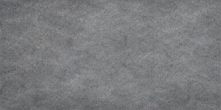 A dark grunge backdrop featuring a blend of black leather and fabric textures alongside a rough gray textile material for a blank textured wallpaper design