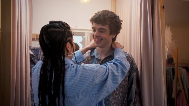 Fitting Room Warm Interaction. Tailored Clothing Fitting With Friendly Stylist Assistance Moment