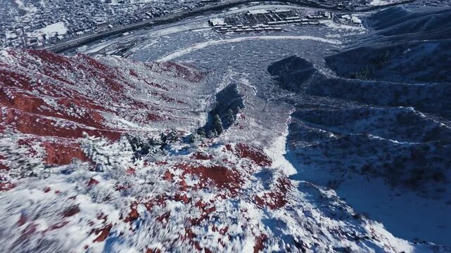 Snowy mountain descent with FPV drone, red rocks and snow, Glenwood Springs, CO 4K 60fps