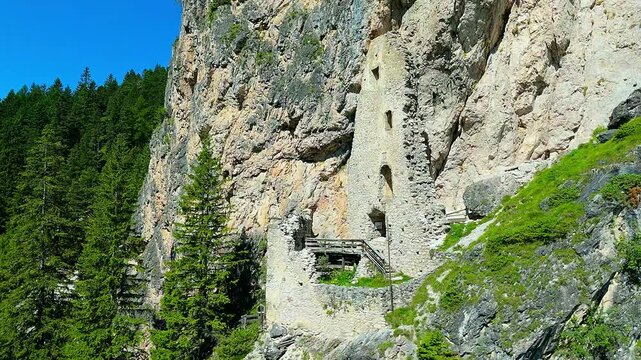Aerial view of Wolkenstein fortress ruins in Selva di Val Gardena. South Tyrol, Italy