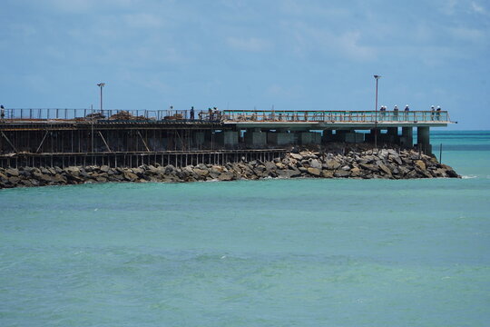 Construction work on a new pier on Iracema beach, with numerous vendor stalls and other amenities for beachgoers. Fortaleza - Cear&aacute;, Brazil.