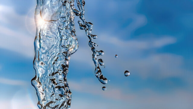 Splashing water and blue sky