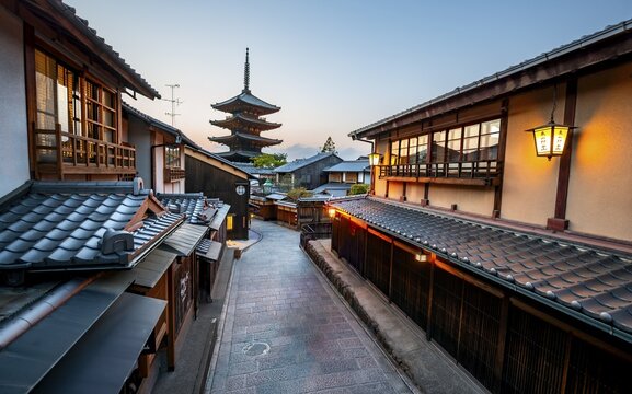 Yasaka dori historic street in the old town with traditional Japanese houses, five-story Yasaka Pagoda of the Buddhist Hōkanji Temple at the back, evening mood, blue hour, Higashiyama, Kyoto, Japan