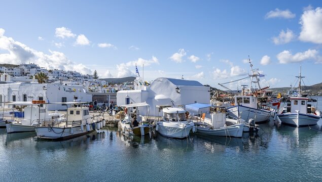 Fishing boats in Naoussa harbour, White Cycladic houses, Naoussa, Paros, Cyclades, Greece