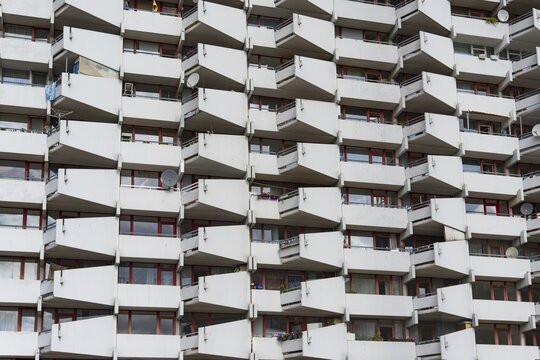 High-rise residential building with balconies and satellite dishes, Trabantenstadt Chorweiler in Cologne, North Rhine-Westphalia, Germany