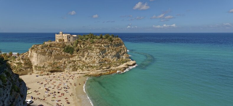 Medieval church Santuario di Santa Maria dell Isola di Tropea built on a rock of sandstone with turquoise sea, Tropea, Vibo Valentia, Calabria, Southern Italy, Italy
