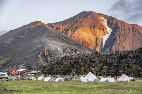 Trekking trail Laugavegur, Landmannalaugar Camp, Trekking trail Laugavegur, Landmannalaugar Camp, Dramatic volcanic landscape, Colourful erosion landscape with mountains, Lava field, Landmannalaugar, Fjallabak Nature Reserve, Su&eth;urland, Iceland