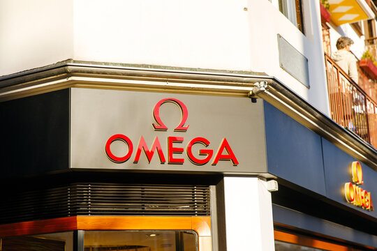 Cortina D Ampezzo, Italy - March 07, 2026: Omega watch store exterior signage featuring the iconic logo and brand name prominently displayed on a building facade