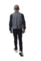 Fototapeta premium back view of a modern retired man walking on white background