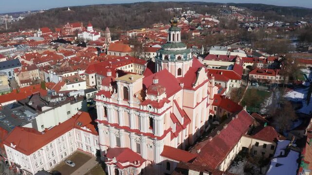 Drone aerial view of the Church of St. Casimir and downtown Vilnius, Lithuania