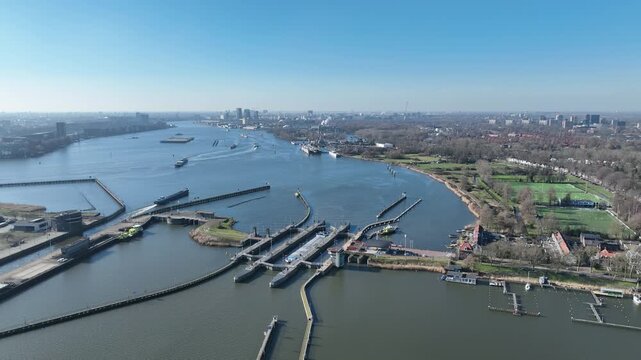Orange sluices in Amsterdam harbor in Europe