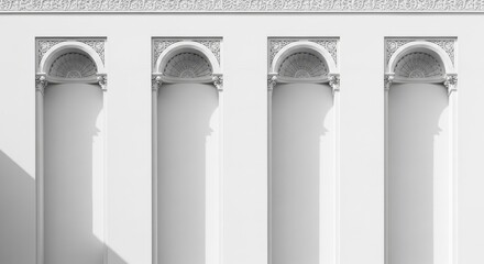 Fototapeta premium Close up of four white columns with ornate arches