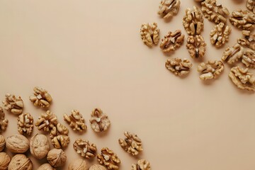 Walnut kernels arranged on beige minimal background with copy space, healthy organic food concept