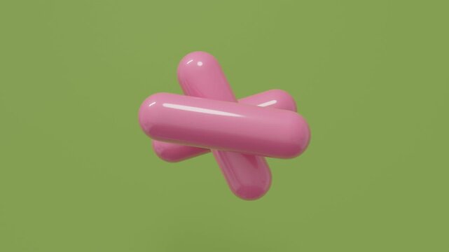 Minimal 3D composition with glossy pink capsules rotating smoothly on a green backdrop, designed for modern product advertising, healthcare branding, and stylish motion graphics backgrounds