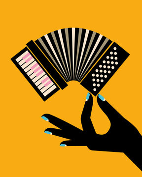 Hand holding a mini accordion