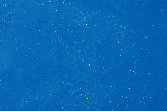 Deep Blue Artisan Paper with bright Star-like Flecks Background