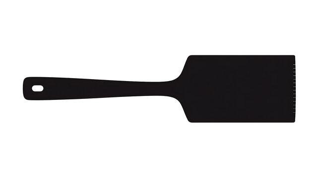 A black spatula laying. The spatula is clean and ready for cooking