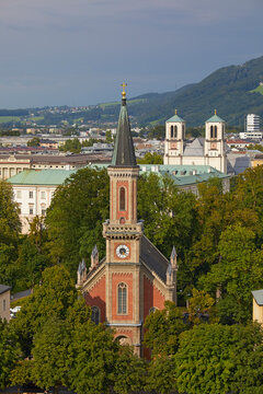 A clock tower in a city, Salzburg, Austria