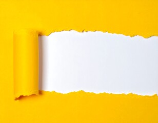 Torn yellow paper revealing a white background, creative concept.